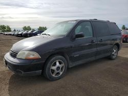 Salvage cars for sale from Copart Rocky View County, AB: 2002 Ford Windstar Sport