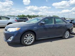 Salvage cars for sale at auction: 2014 Toyota Camry Hybrid