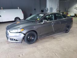 Salvage cars for sale at Moncton, NB auction: 2014 Ford Fusion Titanium