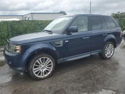 Salvage cars for sale at Orlando, FL auction: 2011 Land Rover Range Rover Sport LUX