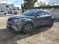 Salvage cars for sale at Opa Locka, FL auction: 2019 Toyota C-HR XLE