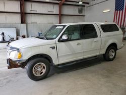 Salvage trucks for sale at Lufkin, TX auction: 2001 Ford F150 Supercrew