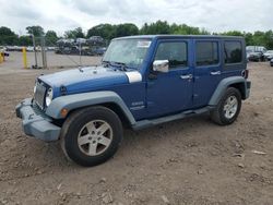 Salvage cars for sale from Copart Chalfont, PA: 2010 Jeep Wrangler Unlimited Sport
