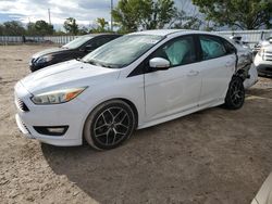 Salvage cars for sale from Copart Riverview, FL: 2015 Ford Focus SE