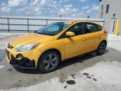 Salvage cars for sale from Copart Ontario Auction, ON: 2012 Ford Focus SE