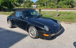 Salvage cars for sale at Opa Locka, FL auction: 1997 Porsche 911 Carrera 2