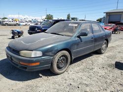 Buy Salvage Cars For Sale now at auction: 1994 Toyota Camry XLE