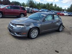 Salvage cars for sale at Woodburn, OR auction: 2010 Ford Fusion Hybrid