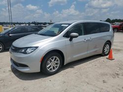 Flood-damaged cars for sale at auction: 2023 Chrysler Voyager LX