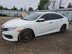 Carros salvage sin ofertas aún a la venta en subasta: 2017 Honda Civic Touring