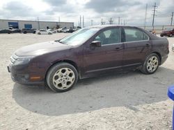 Salvage cars for sale from Copart Haslet, TX: 2011 Ford Fusion SE