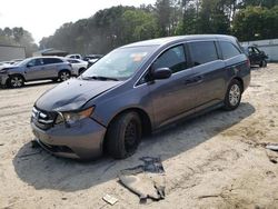 Honda Odyssey lx salvage cars for sale: 2014 Honda Odyssey LX