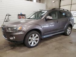 Salvage cars for sale at Blaine, MN auction: 2011 Mitsubishi Outlander SE