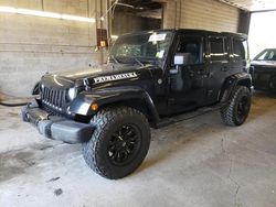 Salvage cars for sale from Copart Angola, NY: 2014 Jeep Wrangler Unlimited Sahara