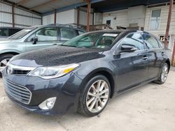 Carros dañados por inundaciones a la venta en subasta: 2014 Toyota Avalon Base