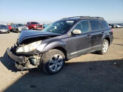 Salvage SUVs for sale at auction: 2011 Subaru Outback 2.5I Limited