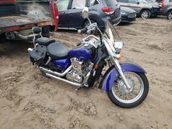 Salvage motorcycles for sale at Kincheloe, MI auction: 2004 Honda VT750 CA