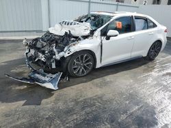 Salvage cars for sale at Opa Locka, FL auction: 2022 Toyota Corolla SE