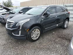 Carros dañados por inundaciones a la venta en subasta: 2019 Cadillac XT5