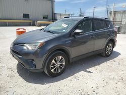 Salvage cars for sale at Haslet, TX auction: 2016 Toyota Rav4 HV XLE