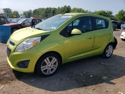 Salvage cars for sale from Copart Chalfont, PA: 2013 Chevrolet Spark 1LT