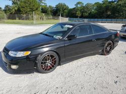 Salvage cars for sale from Copart Fort Pierce, FL: 1999 Toyota Camry Solara SE