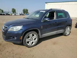 Salvage cars for sale from Copart Rocky View County, AB: 2011 Volkswagen Tiguan S