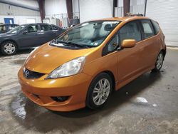 Honda salvage cars for sale: 2009 Honda FIT Sport