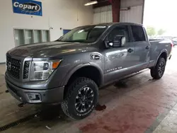 Salvage trucks for sale at Angola, NY auction: 2016 Nissan Titan XD SL