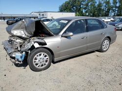 Saturn salvage cars for sale: 2003 Saturn L200