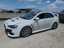 Carros dañados por inundaciones a la venta en subasta: 2013 Mitsubishi Lancer Evolution GSR