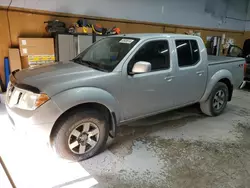Salvage cars for sale from Copart Kincheloe, MI: 2010 Nissan Frontier Crew Cab SE