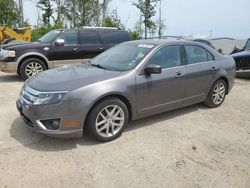 Salvage cars for sale from Copart Milwaukee, WI: 2011 Ford Fusion SEL