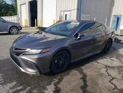 Flood-damaged cars for sale at auction: 2022 Toyota Camry XSE