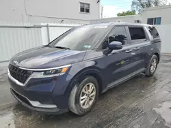 Salvage cars for sale at Opa Locka, FL auction: 2022 KIA Carnival LX