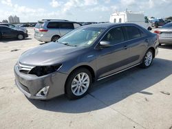 Salvage cars for sale at New Orleans, LA auction: 2012 Toyota Camry Hybrid