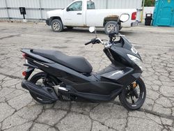 Salvage motorcycles for sale at West Mifflin, PA auction: 2015 Honda PCX 150