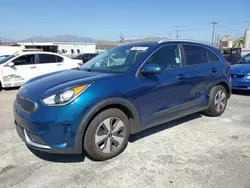 Salvage cars for sale at auction: 2019 KIA Niro FE