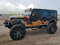 Flood-damaged cars for sale at auction: 2012 Jeep Wrangler Unlimited Sahara