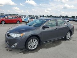 Flood-damaged cars for sale at auction: 2014 Toyota Camry L