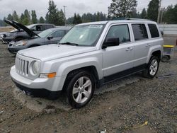 Salvage cars for sale from Copart Graham, WA: 2011 Jeep Patriot Latitude