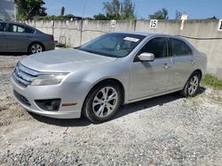 Salvage cars for sale at Opa Locka, FL auction: 2012 Ford Fusion SE