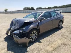 Salvage cars for sale from Copart Anderson, CA: 2015 Toyota Camry Hybrid