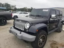 Jeep salvage cars for sale: 2014 Jeep Wrangler Unlimited Sport