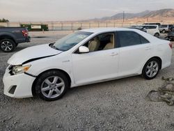 Salvage cars for sale at Magna, UT auction: 2012 Toyota Camry Hybrid