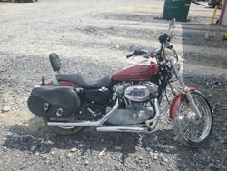 Salvage motorcycles for sale at Ebensburg, PA auction: 2009 Harley-Davidson XL883 C