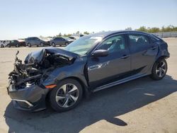 Salvage cars for sale at Fresno, CA auction: 2019 Honda Civic LX