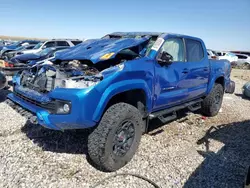 Salvage cars for sale at Magna, UT auction: 2018 Toyota Tacoma Double Cab