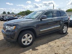 Carros dañados por inundaciones a la venta en subasta: 2011 Jeep Grand Cherokee Laredo