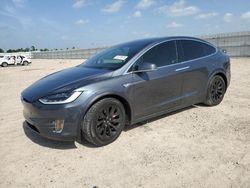 Carros dañados por inundaciones a la venta en subasta: 2016 Tesla Model X